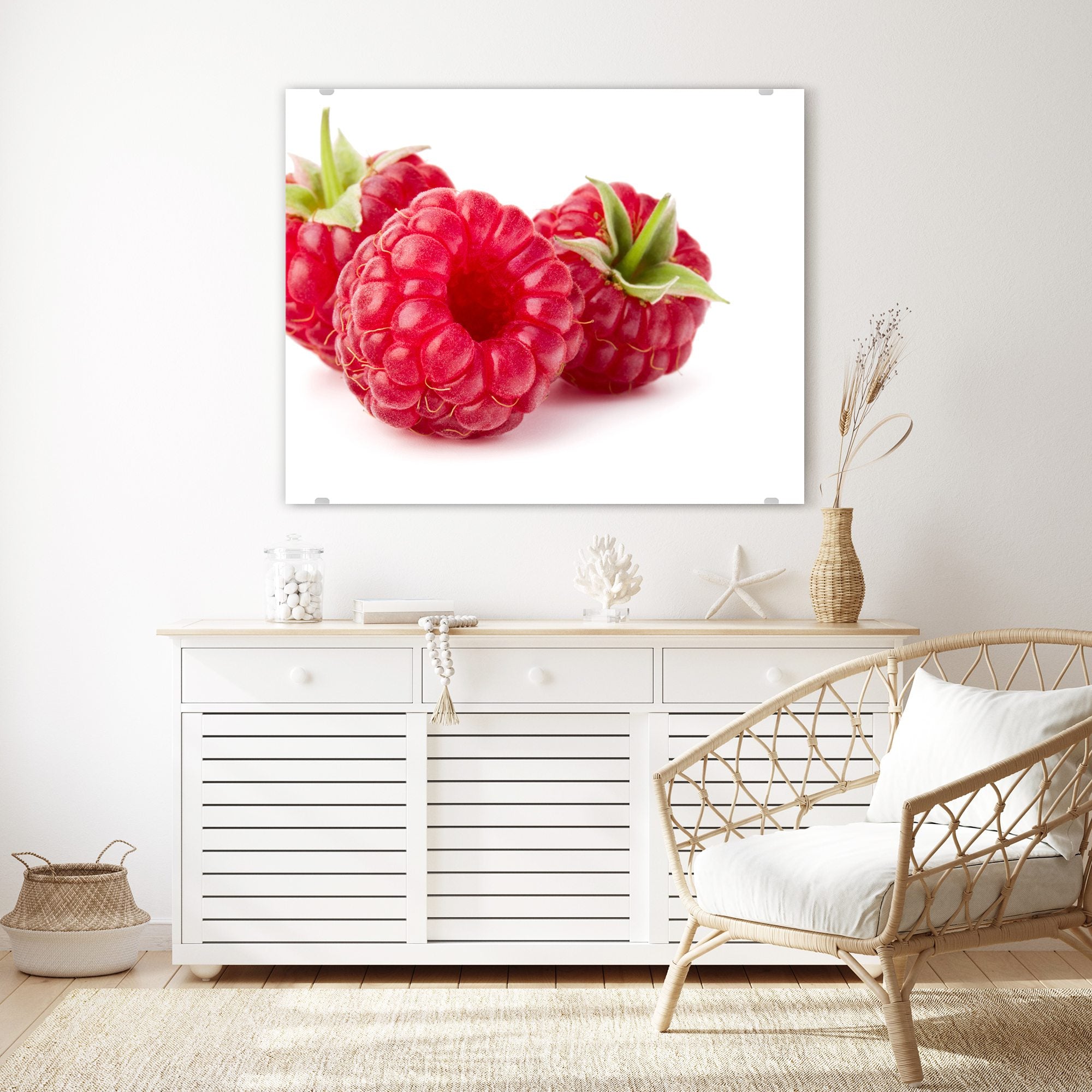 Wandbild - Drei Himbeeren mit Blatt