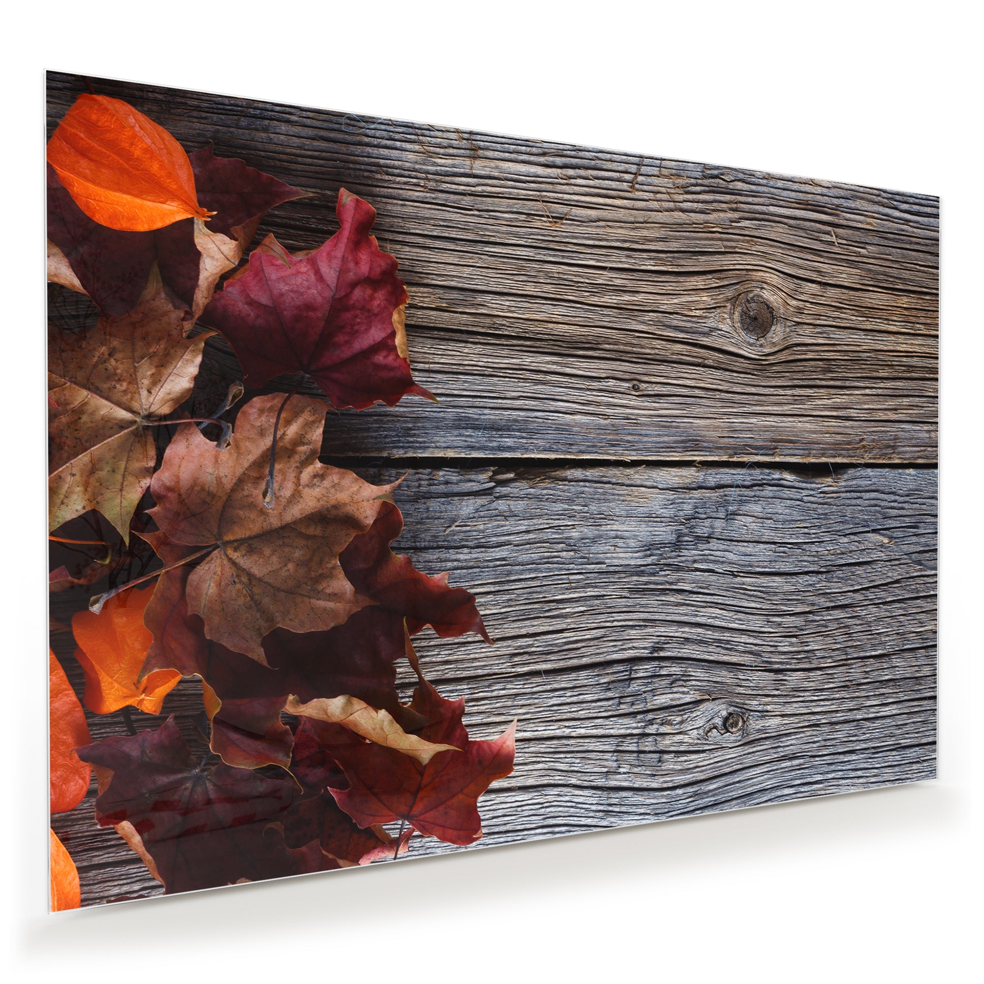 Wandbild - Herbstlaub auf Holztisch